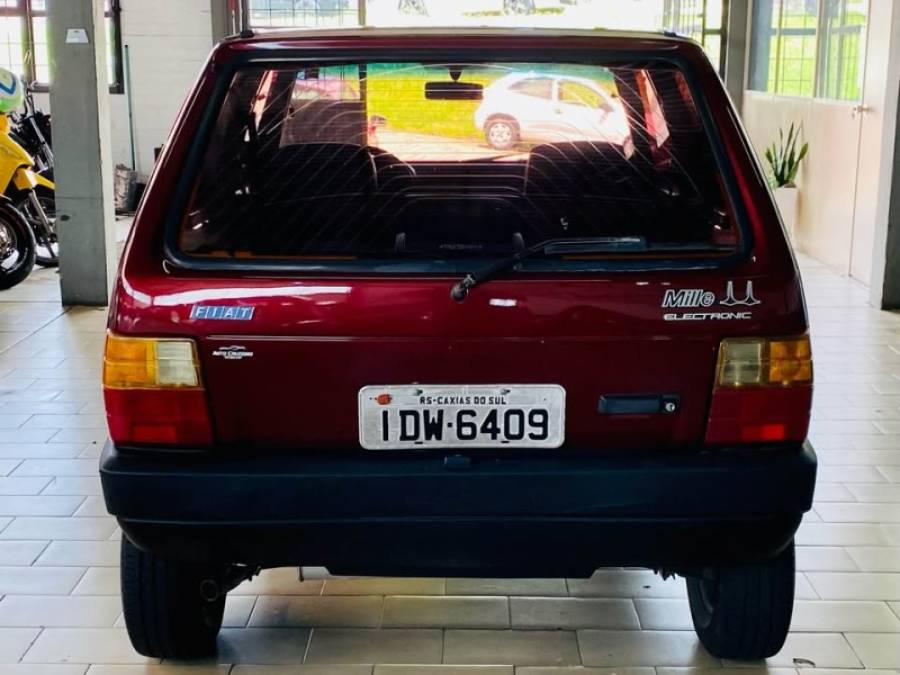 FIAT - UNO - 1995/1996 - Vinho - R$ 10.990,00