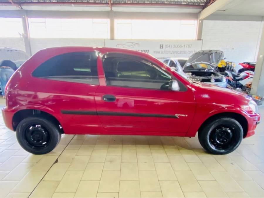 CHEVROLET - CELTA - 2009/2010 - Vermelha - R$ 19.999,00